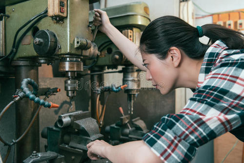 woman drilling operation